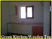 Green Kitchen with Wooden Worktop