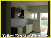 Yellow Kitchen with White Worktop